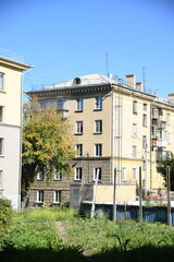 Architecture of old Soviet Union houses in Stalin's Empire style. Exterior of the facade of a vintage residential building in Russia