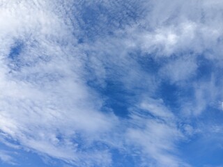 Blue Sky with Soft White Clouds