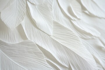 Close-up of textured white paper feathers.