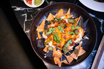 Nachos with jalapeno cheese sauce 