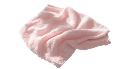 Soft pink towel draped casually on a flat surface, showcasing its plush texture and gentle color suitable for bathroom or spa use.