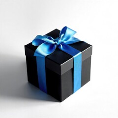 black gift box with autumn leaves on a shiny light background