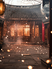 Obraz premium Vibrant firecrackers illuminate a traditional Chinese courtyard during a festive celebration at dusk