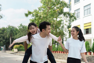 Happy Family Enjoying Outdoor Activities Together for Wellness and Bonding