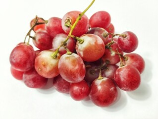 Bunch of red grapes on white background for advertising