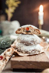 Christmas stollen cookies on the festive table, Scandinavian style, Scandinavian Christmas, candles, Christmas tree