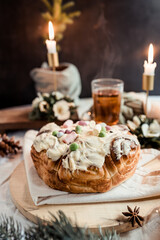 Cinnabon with marshmallows, buttercream and nuts on a festive table, Scandinavian style, Scandinavian Christmas