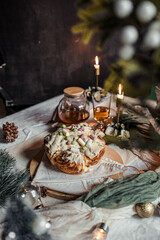 Cinnabon with marshmallows, buttercream and nuts on a festive table, Scandinavian style, Scandinavian Christmas