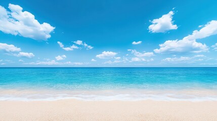 A beautiful blue ocean with a few clouds in the sky