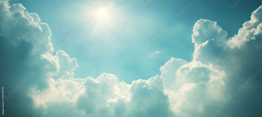Poster sun rays shining on a cloudscape against a teal blue sky.