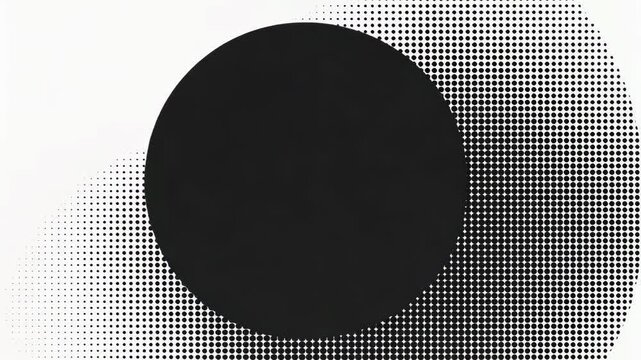 Abstract black circle on a white background with dotted texture creating contrast and visual interest