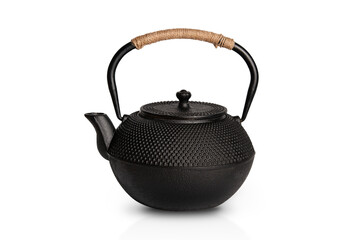 Black cast iron teapot. Heat resistant unbreakable teapot for brewing tea with jute handle isolated on white background.