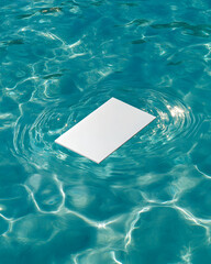 Blank card floating pool summer; turquoise water background; mock-up.