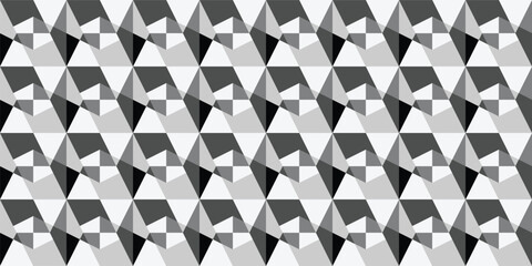 Obraz premium A black and white background with a pattern of geometric shapes
