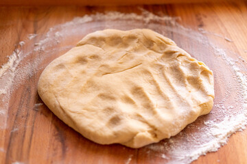 Raw yeast dough. Bread baking. Food concept