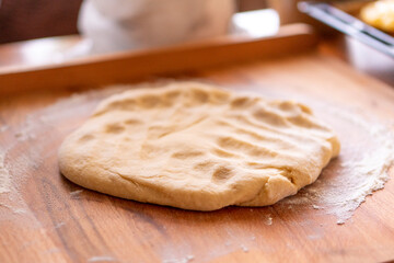 Raw yeast dough. Bread baking. Food concept