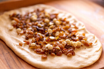 the process of making homemade pastries, dough, pie, stollen with different candied fruits. Stollen photo recipe. Step by step cooking process.