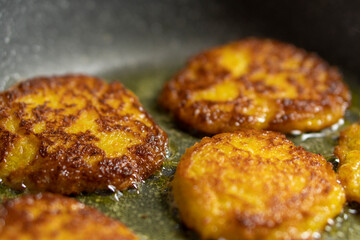 Potato pancakes fried in a frying pan