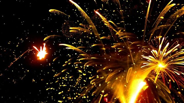 Efecto de explosi&oacute;n de fuegos artificiales de part&iacute;culas bokeh de oro. Noche. Fiesta. A&ntilde;o nuevo