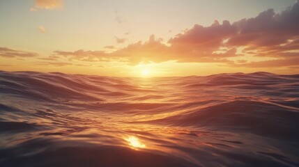 A serene sunset over the ocean, with gentle waves reflecting warm hues.