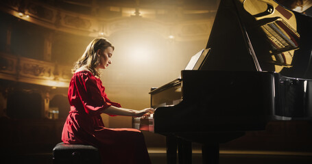 Talented Female Pianist Captivates the Audience with Her Masterful Performance on a Grand Piano. On...