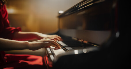 Close Up on Pianist Hands Practicing to Play Jazz on a Grand Piano. Female Musician is Focused on Creating Beautiful Instrumental Song as She Undergoing a Learning Process