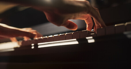 Close Up on an Anonymous Pianist Performing Classical Instrumental Music on Stage. Female Musician...