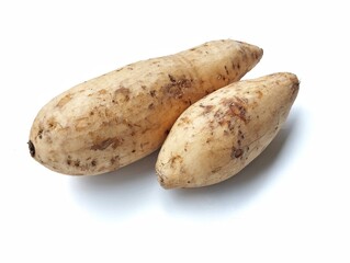 Fresh sweet potatoes isolated on white background