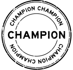 Grunge black champion word round rubber seal stamp on white background