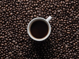Fototapeta premium Espresso cup with foamy coffee in front of a pile of fresh roasted coffee beans.