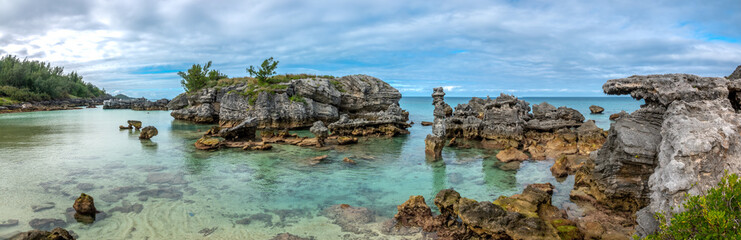 Turquoise waters and fascinating rock formations in the beaches of Tobacco Bay, St. George Island, Bermuda, British Overseas Territory, UK