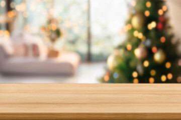 Empty wooden table top blurred christmas tree with yellow bokeh on background. Christmas xmas tree with festive bokeh light holiday on wood table blur  room with a christmas tree background, suitable 