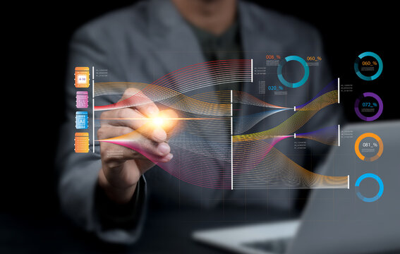 Businessman analyze and visualize complex information on a virtual screen using AI to process data. Big data technology and data science.Data flow.Digital neural network.artificial intelligence. - Powered by Adobe