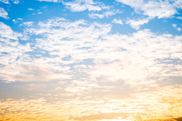 Sky,sunset, beautiful , luxury soft gradient orange gold clouds and sunlight on the blue sky perfect for the background, Sunrise on morning or everning in winter warm time ,Twilight summer,silhouette