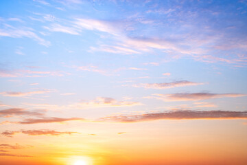 Sky,sunset, beautiful , luxury soft gradient orange gold clouds and sunlight on the blue sky perfect for the background, Sunrise on morning or everning in winter warm time ,Twilight summer,silhouette