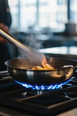 Chef using flame to cook pancakes, breakfast meal. Professional kitchen environment with stove and oven for cooking.