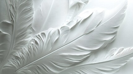 Close-up of embossed white feathers on a light background.