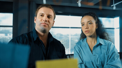 Professional business people discuss about creative marketing idea in modern office. Business team...