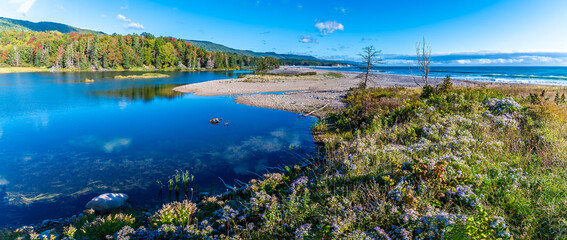 A panorama view across MacDonalds pond at the Little River on the Cabot Trail, Nova Scotia, Canada in the fall © Nicola