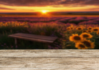 Wooden table top on blur lavender,sunflower field and mountain background in evening time. Leisure, travel for montage product display or design key visual layout.View of copy space.