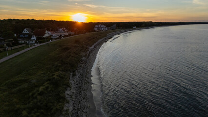 Drone aerial view of Glowe beach at the north of Germany at sunset