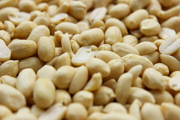 Pile of peeled peanut, group of nuts. Food ingredients