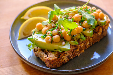Vegan Avocado Toast with Chickpeas, Arugula, and Seeds - Healthy Breakfast