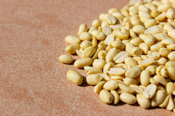 Pile of peeled peanut, group of nuts. Food ingredients