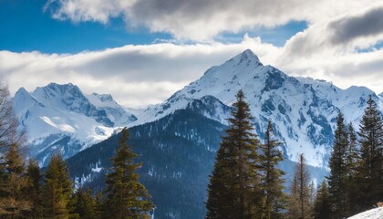 Naklejka premium Majestic Snow-Capped Mountains with Pine Trees and a Dramatic Sky in Winter