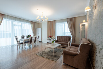 Elegant Home Living and Dining Room Interior with Modern Furniture and Large Windows