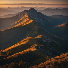 A stunning mountain ridge glowing in the warm light of dawn.
