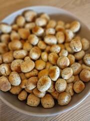 A bowl of Kūčiukai (Lithuanian traditional Christmas Eve biscuits with poppy seeds). Christmas culinary heritage. Close-up 