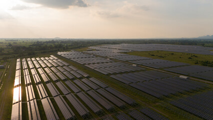 Aerial bird view photo of photovoltaic power station also known as a solar park is large-scale photovoltaic system (PV system) designed for the supply of merchant power into the electricity grid