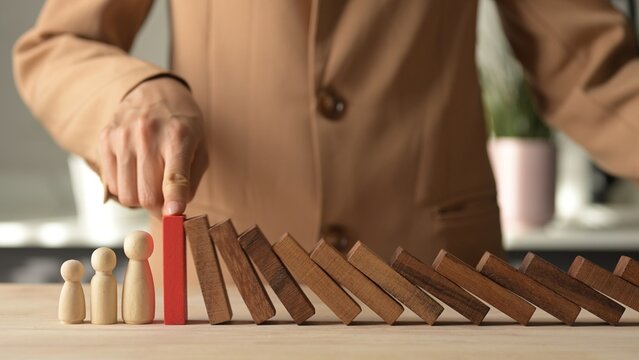 Crisis Management Assessment Financial Planning Strategies to Mitigate Economic Risks Business Environment 4K Stock Video of Wooden Dominoes and Risk Management Approach